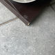 A modernist ebonized and aluminum umbrella stand