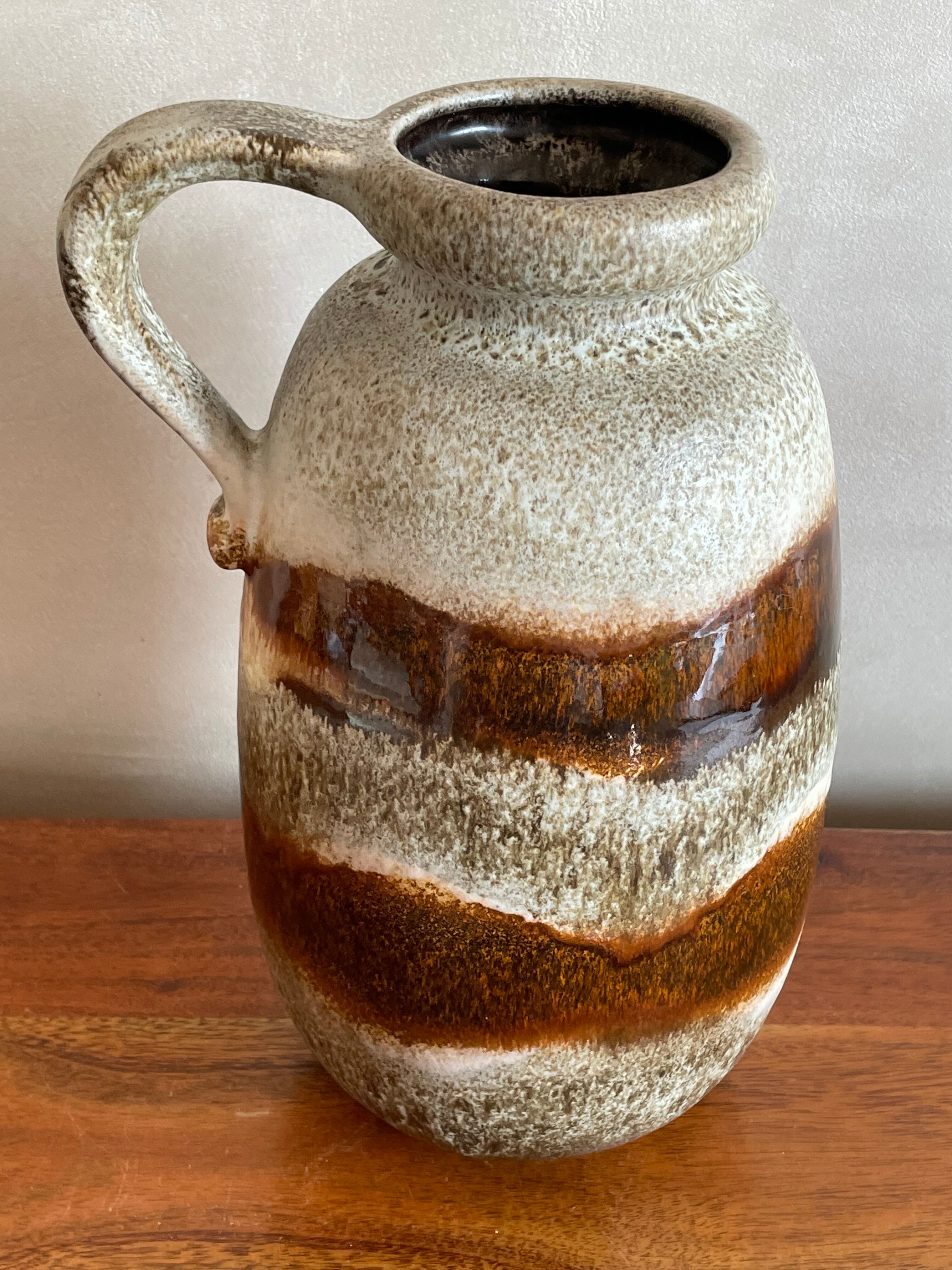 Large mudflated sandstone vase