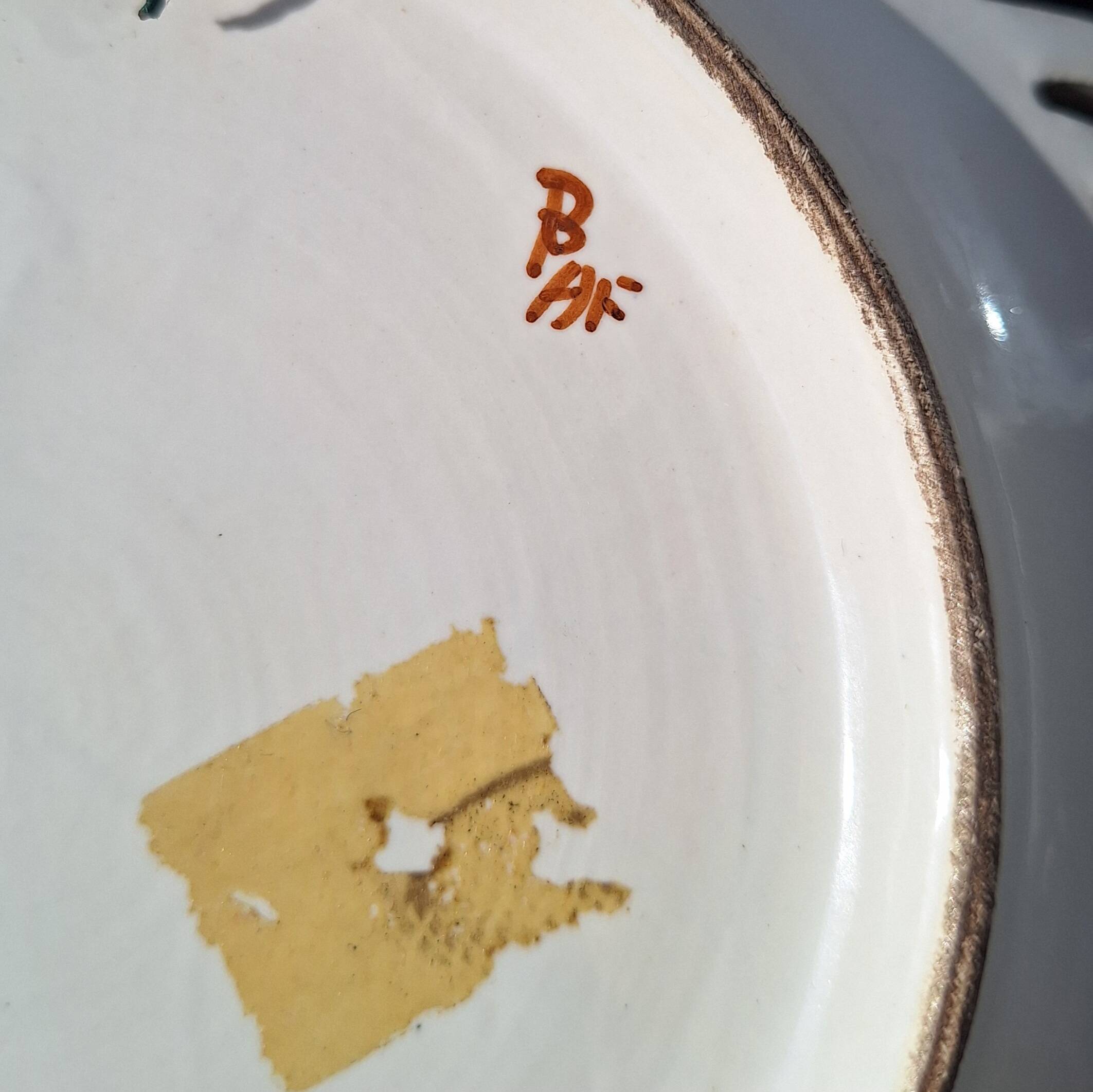 Earthenware plate with Moustiers decoration