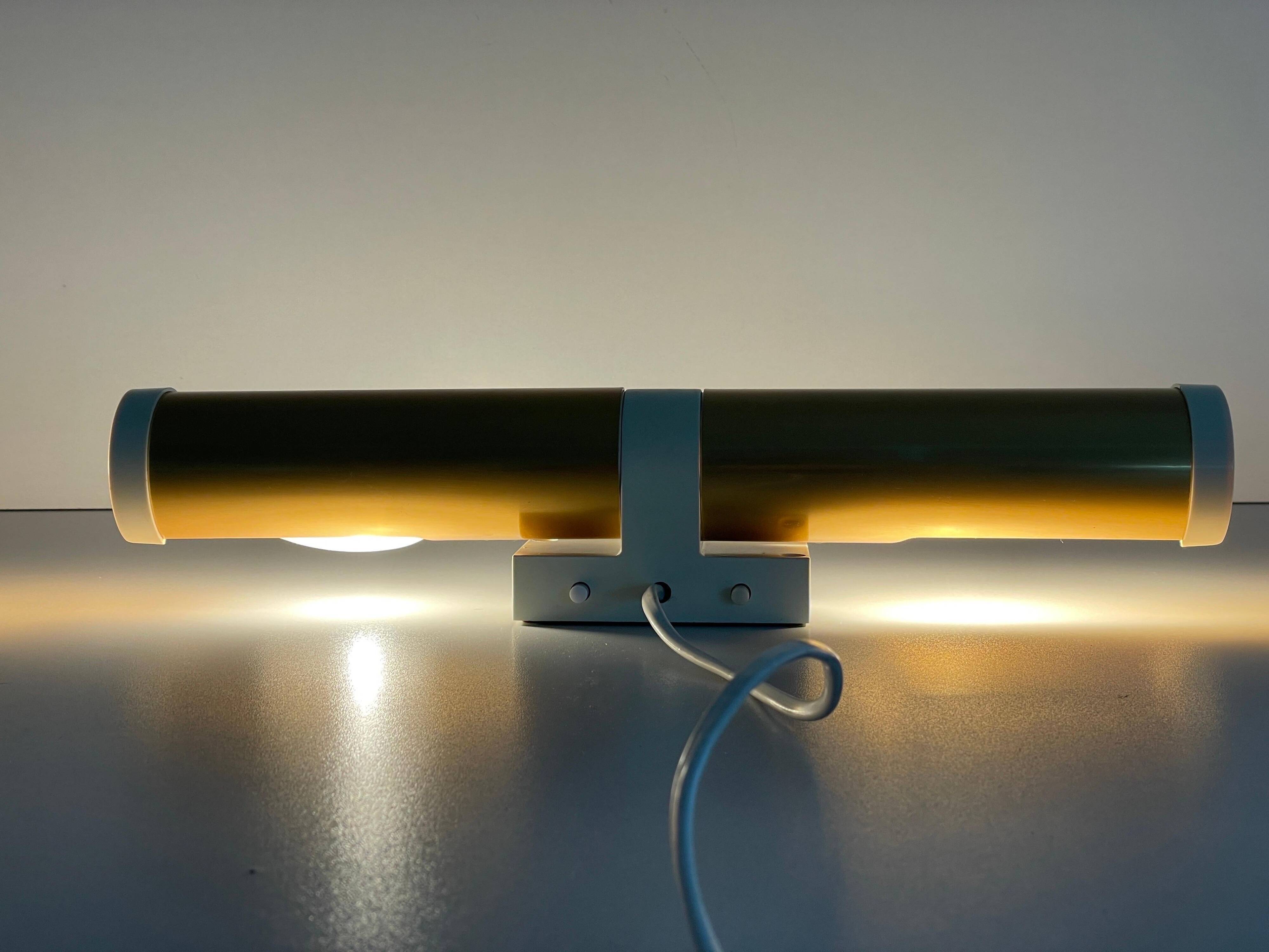 Pair of two-headed wall sconces in gold metal by ERCO, 1970s, Germany