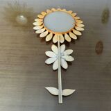 Large 1970s "flower" mirror in orange metal