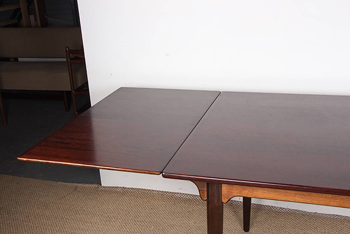 Danish extendable dining table in rosewood, model 54 by Gunni Omann