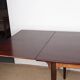 Danish extendable dining table in rosewood, model 54 by Gunni Omann