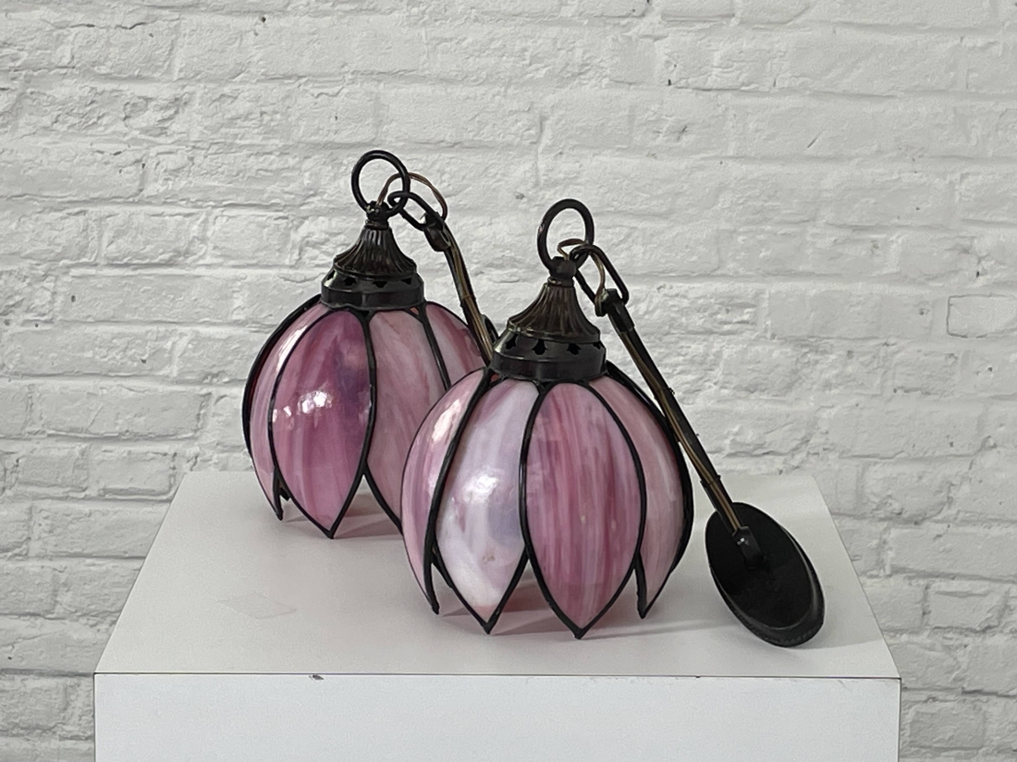 pair of iron wall lamps and Tiffany style glass legs