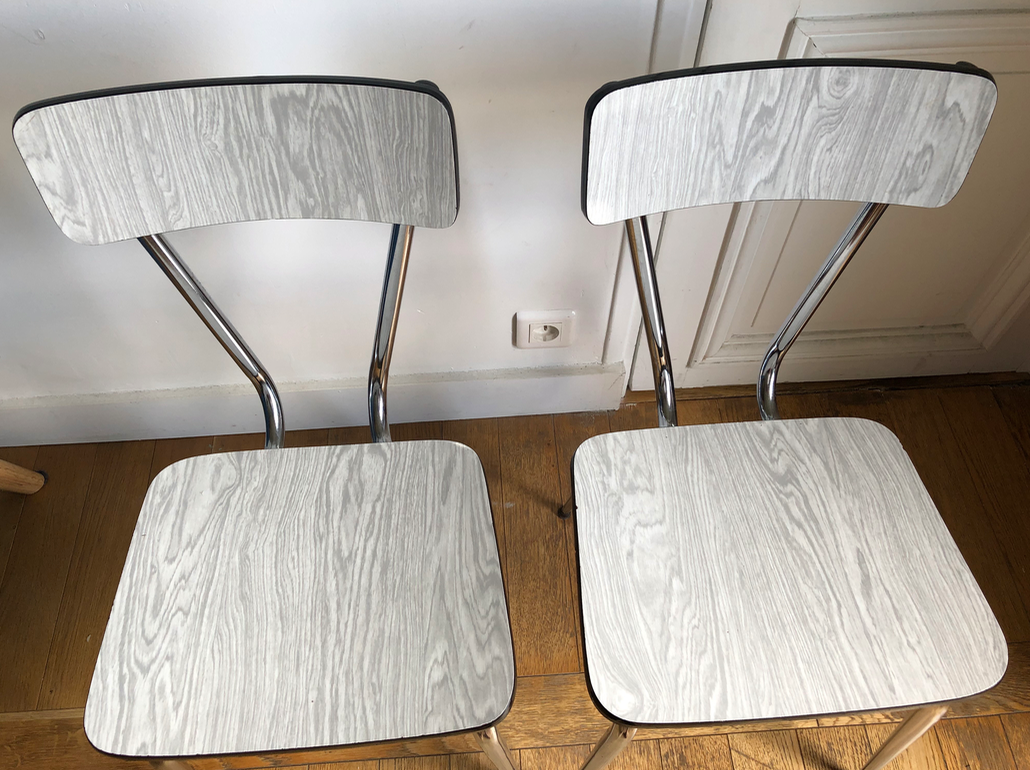 White and grey Formica chairs