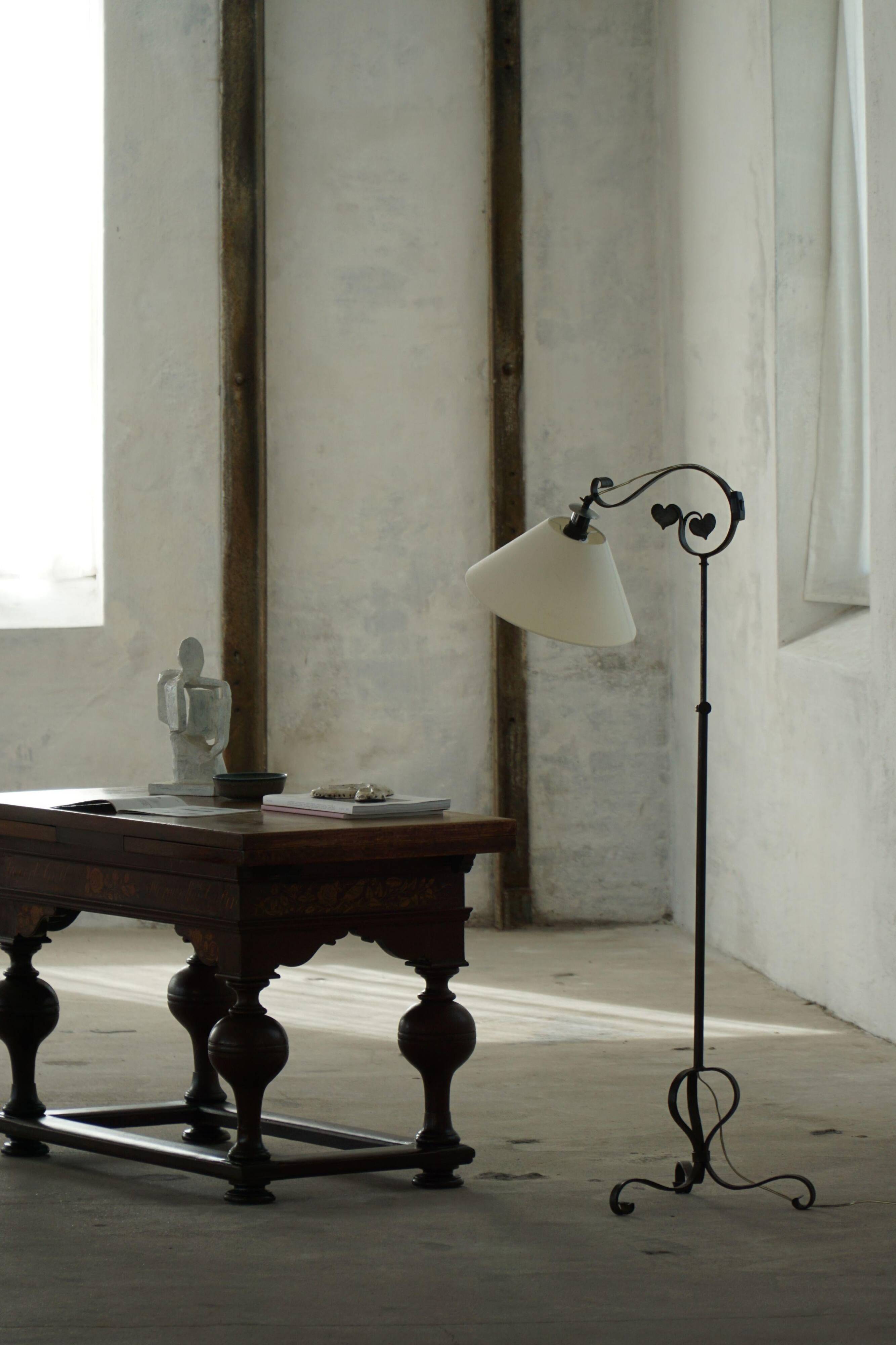 Danish Art Deco, adjustable wrought iron floor lamp, 1930s