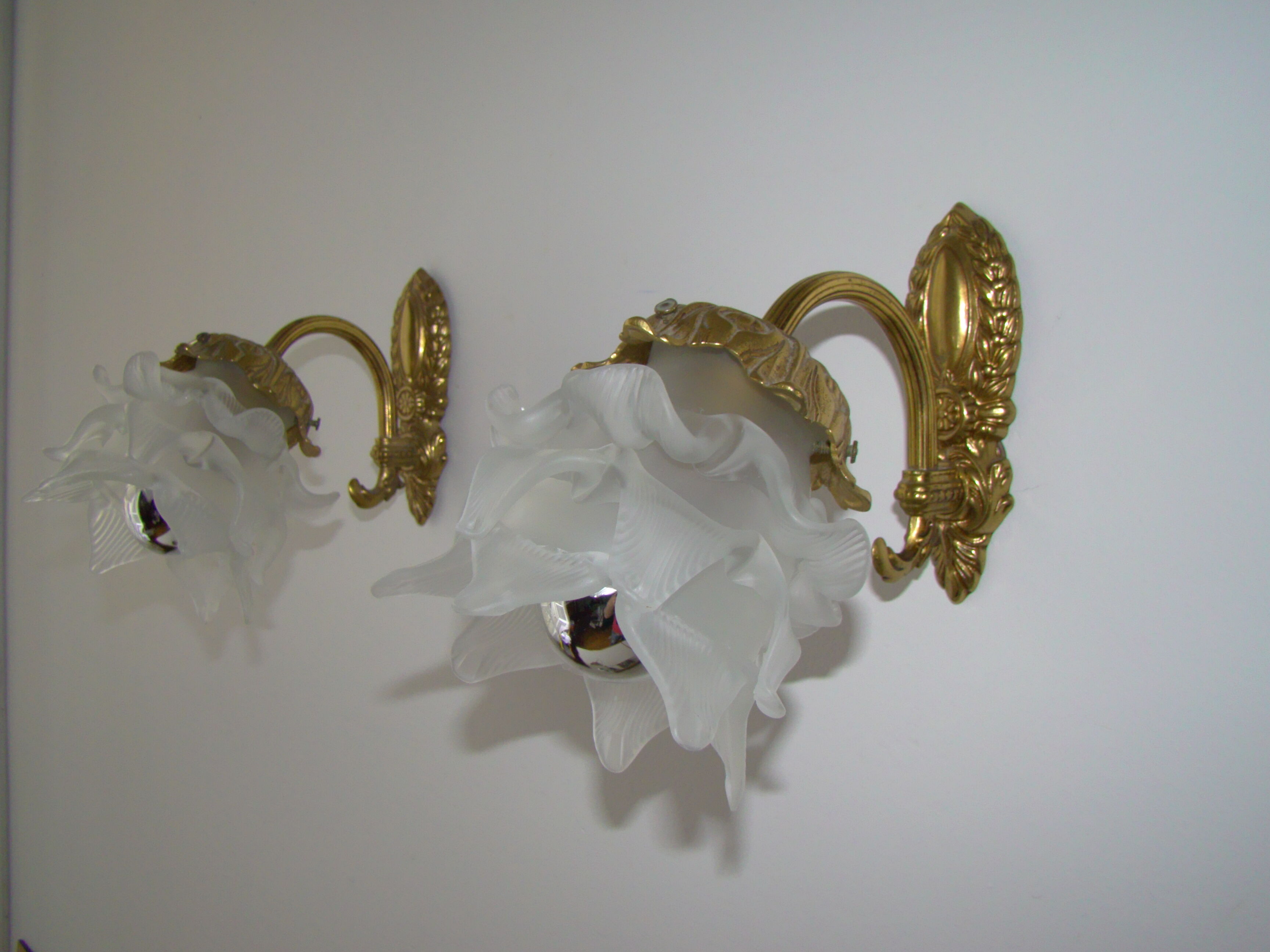 Pair of tanned sconces and glass paste
