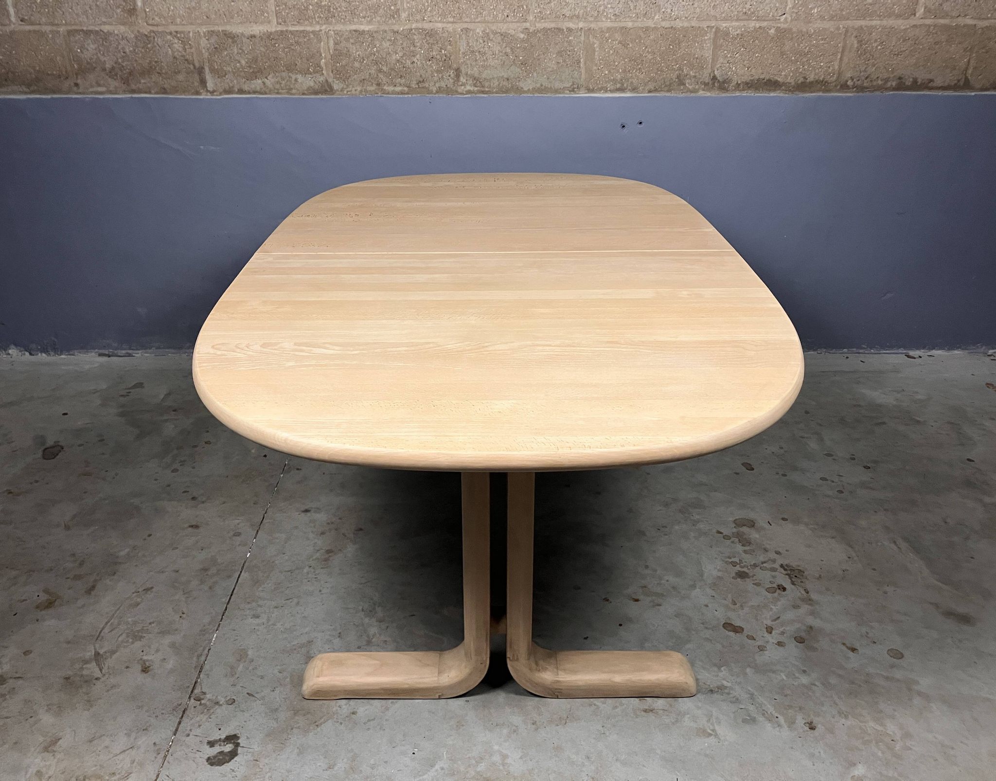 Oval extendable dining table in beech with Danish design.
