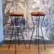 Pair of 1950s iron and rattan bar stools