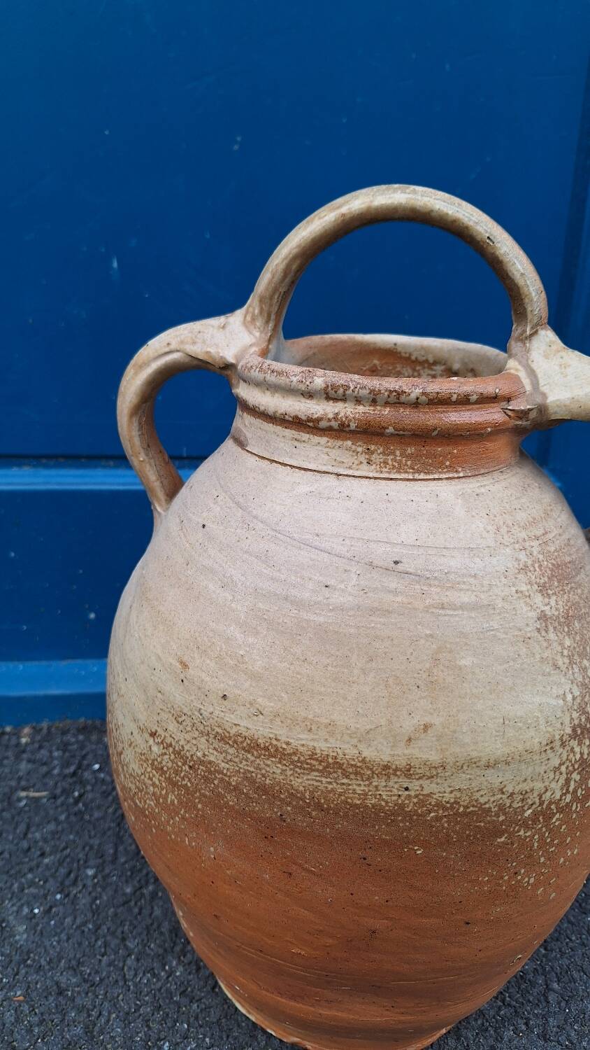 Cruche à eau en terre cuite