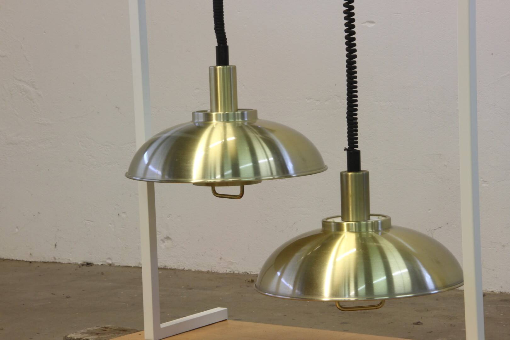 Danish pair of brass colour ceiling lamps attributed to the company Frandsen 1