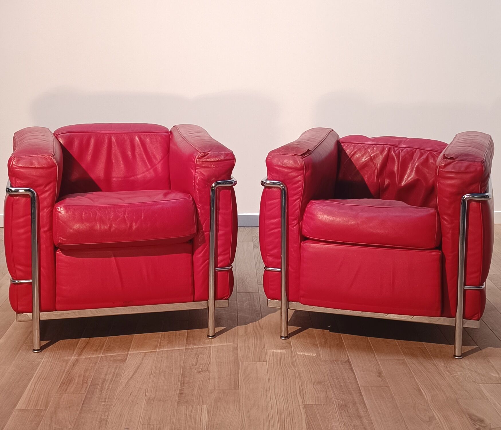 Pair of LC2 armchairs, Le Corbusier for Cassina