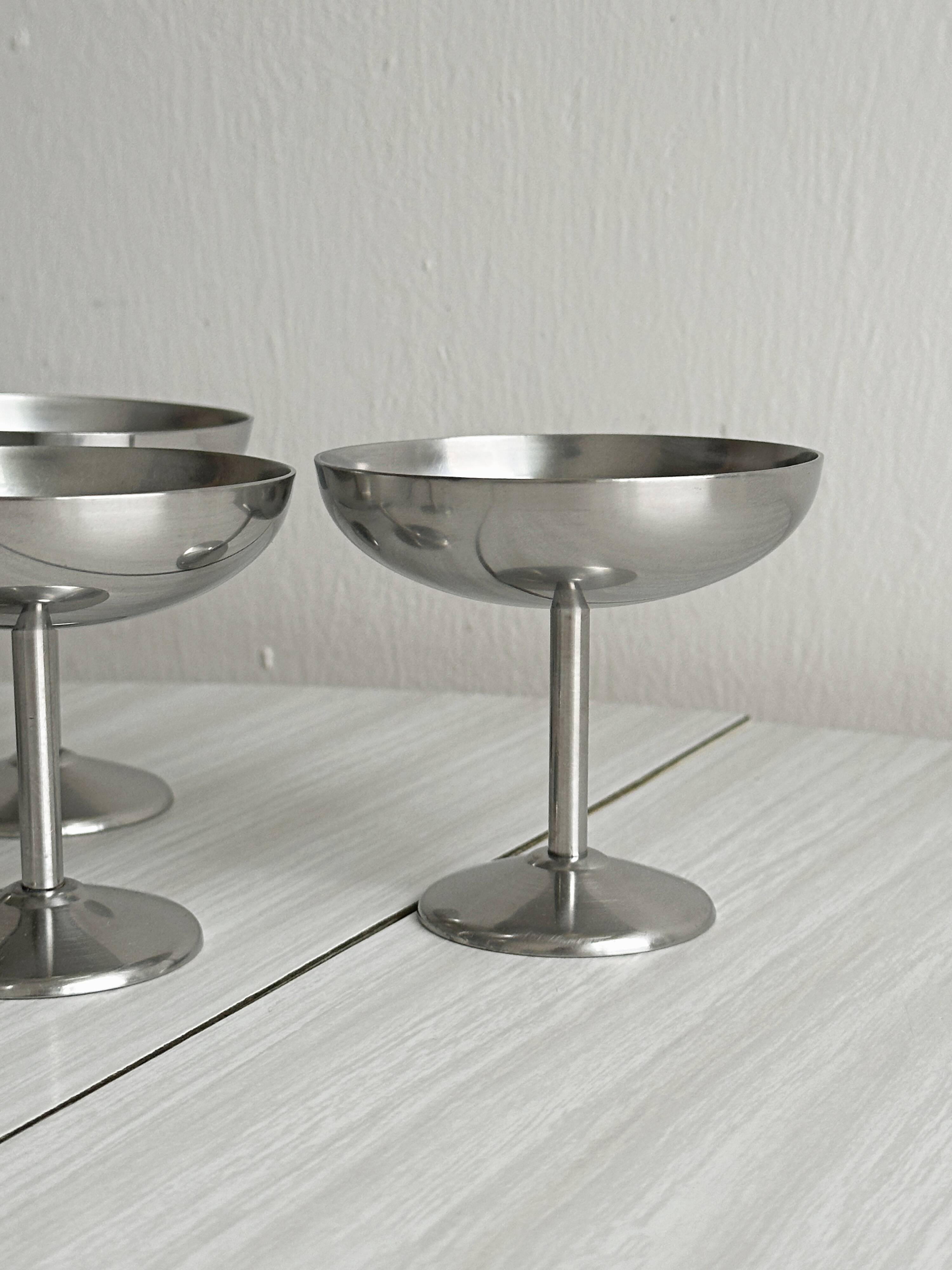 6 metal bowls in the style of Guy Degrenne