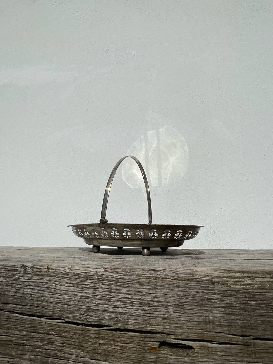 Oval dish with silver-plated metal handle