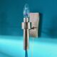Brushed brass wall light with green glass shade "Vitrika". Denmark 1980