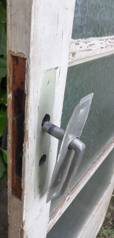 Porte vitrée ancienne
