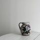 Antique decorative ceramic pitcher