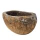 A substantial hand-hewn wooden bowl carved from a single burl section