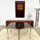 Vintage hexagonal table with smoked glass top and chrome metal structure.