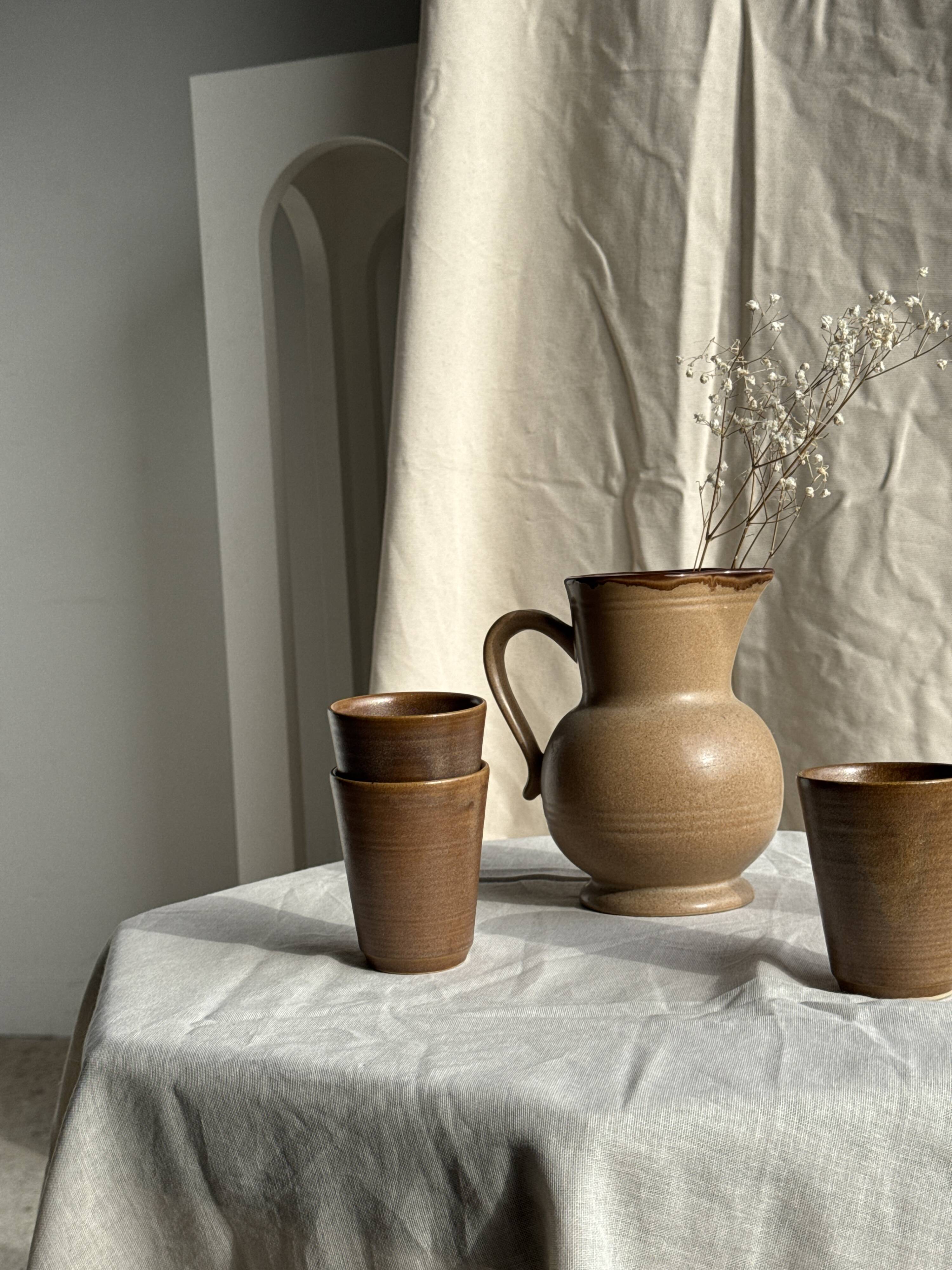 Set of 10 small stoneware mugs from Digoin.