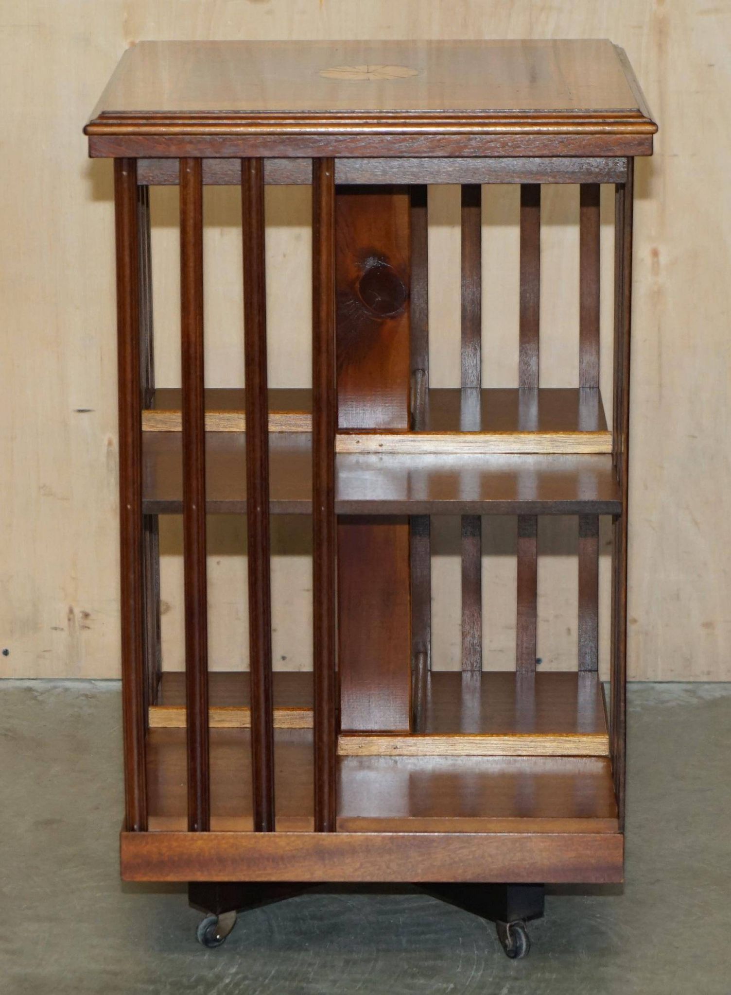 Sheraton Revival rotating library table in walnut and satin wood.
