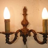Pair of two-light wall lights in gilded bronze