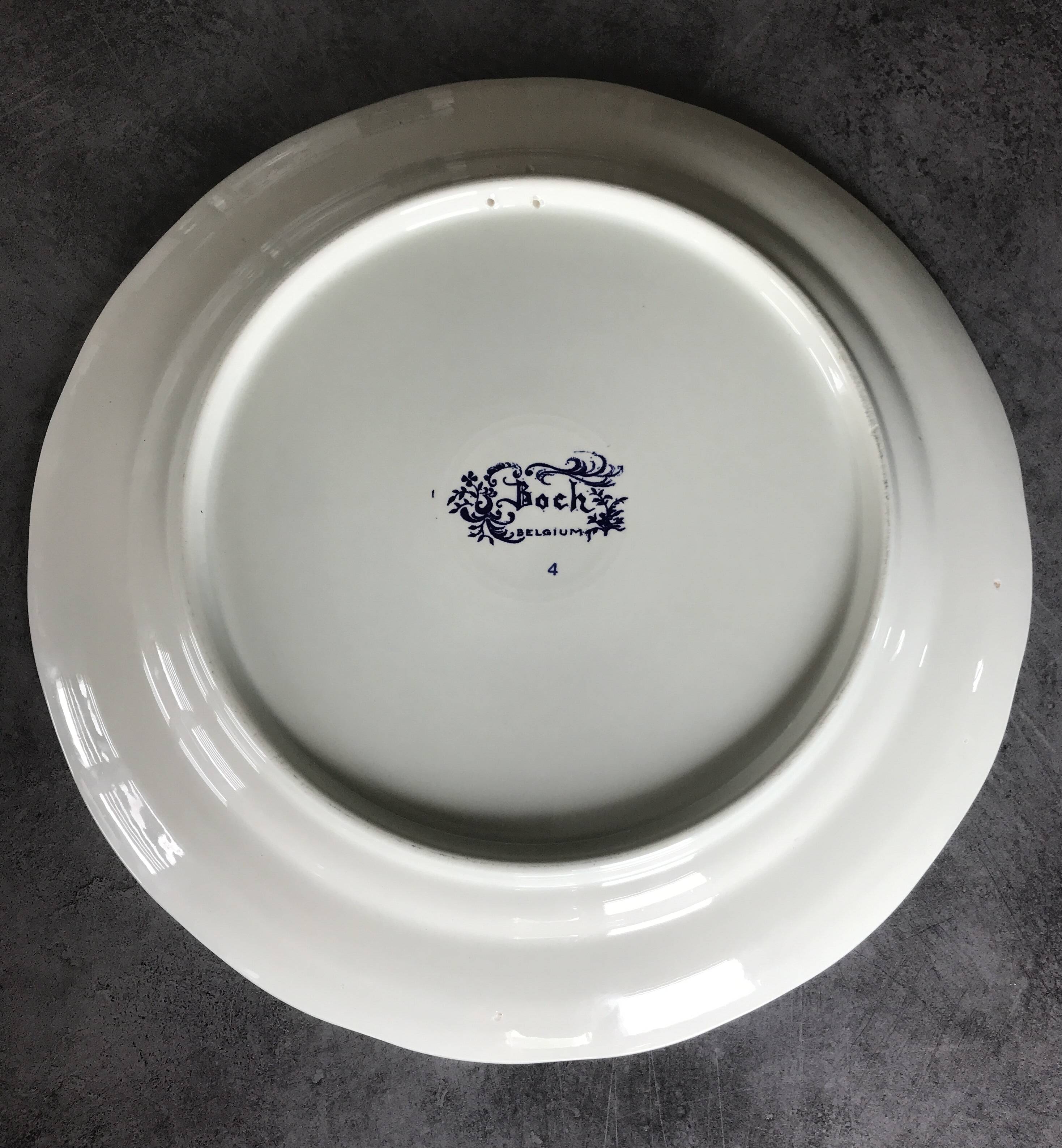 Blue enamelled earthenware wall plate with fisherman decor, Boch La Louvière, Belgium