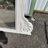 Large decorative mirror in carved wood with shabby patina