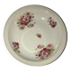 Hollow dish in fired porcelain with floral motifs