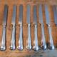 8 old silver metal knives