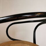 Curved wood and cane armchair called "Le Corbusier"