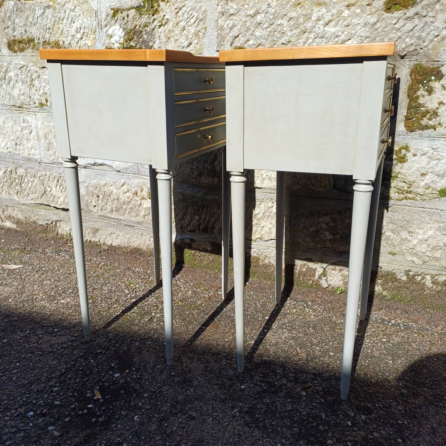 Pair of patinated bedside tables in Louis XVI style