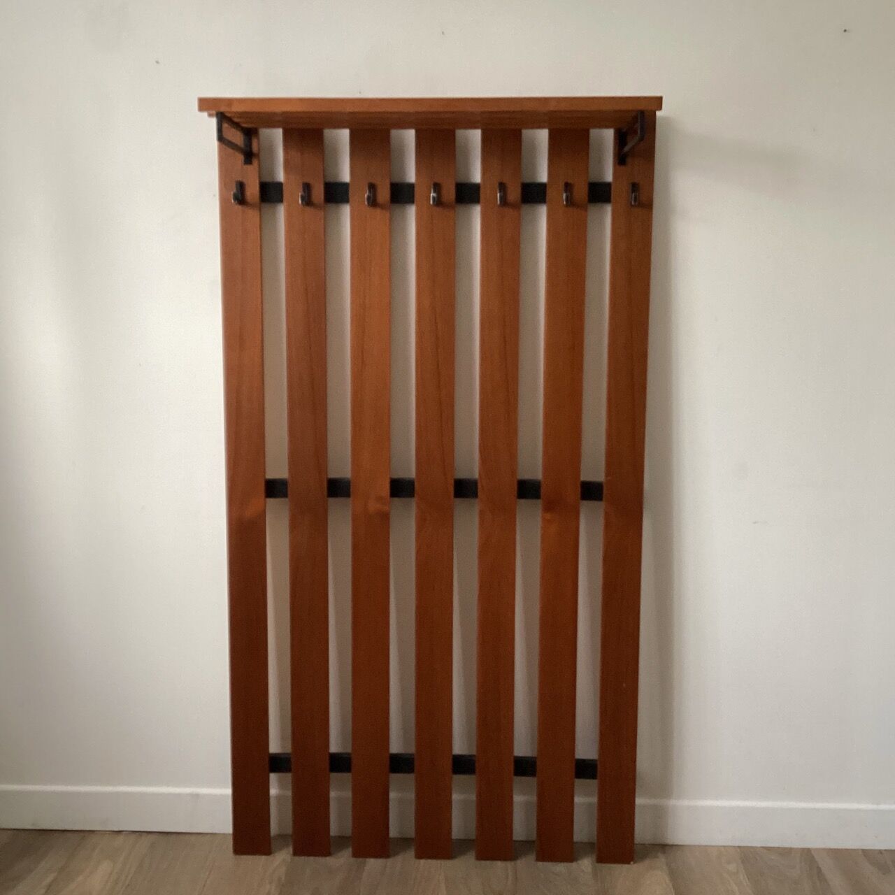 Wooden wall coat rack