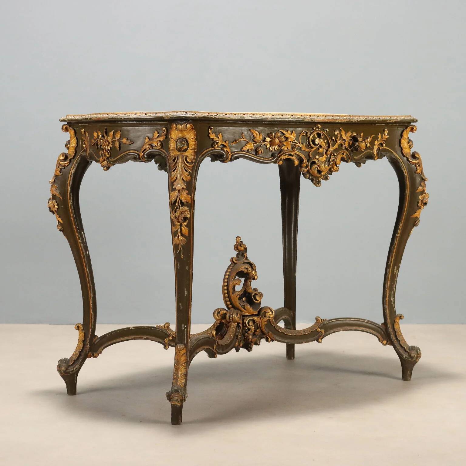 Baroque-style table in carved wood
