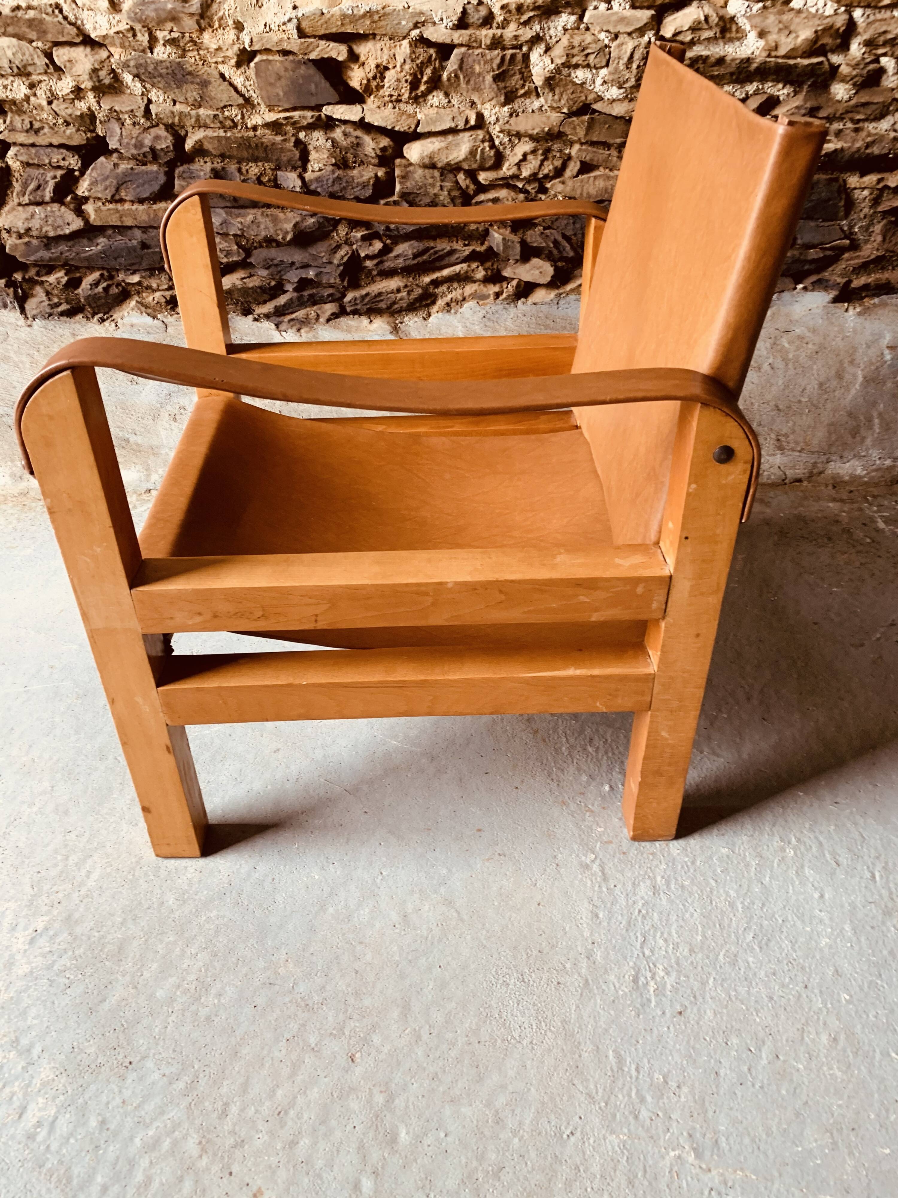 Safari armchair in wood and leather -1950's