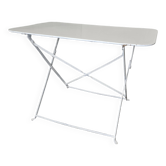 Old folding wrought iron garden table