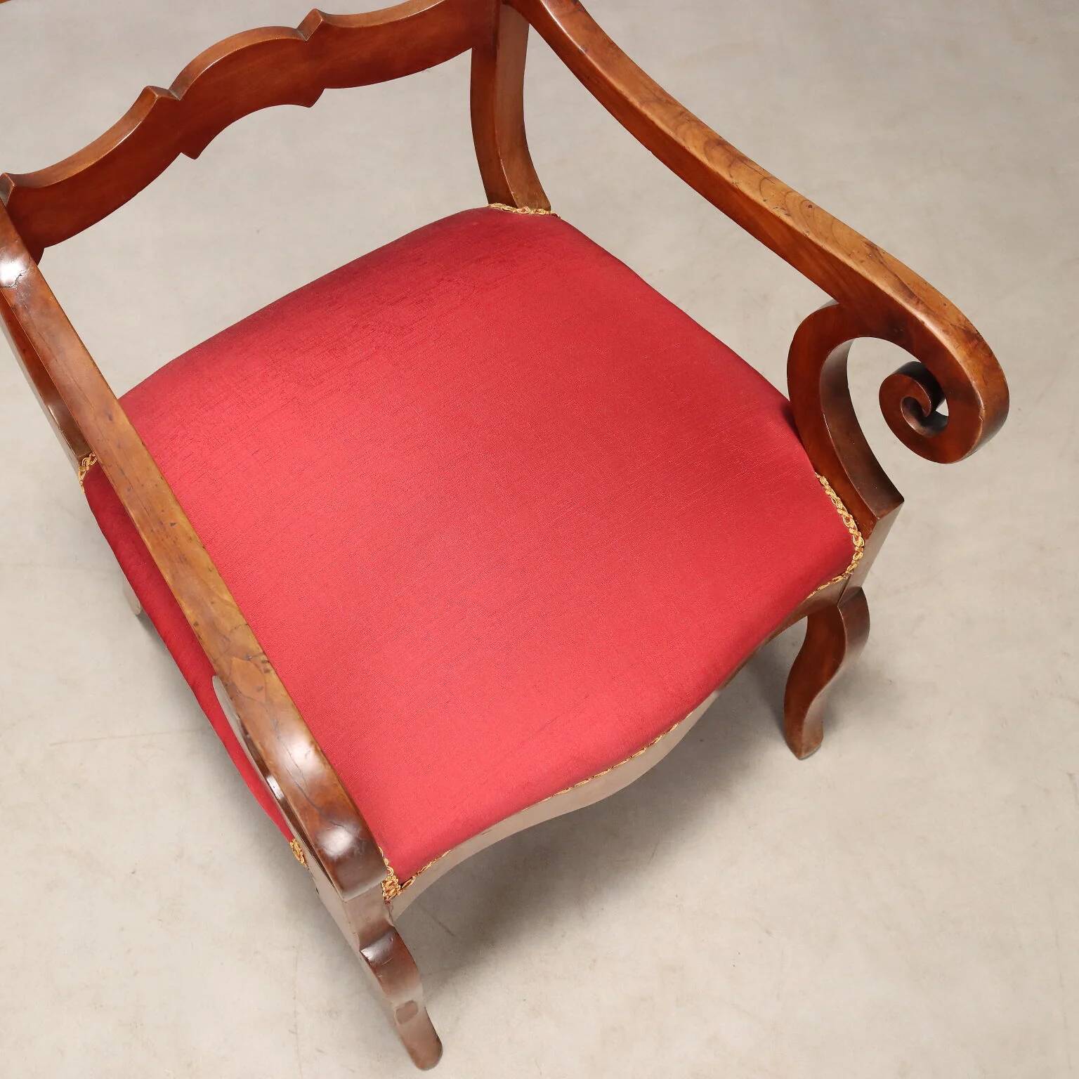 Antique Restoration-style armchair in walnut, fabric, Italy, 19th century.