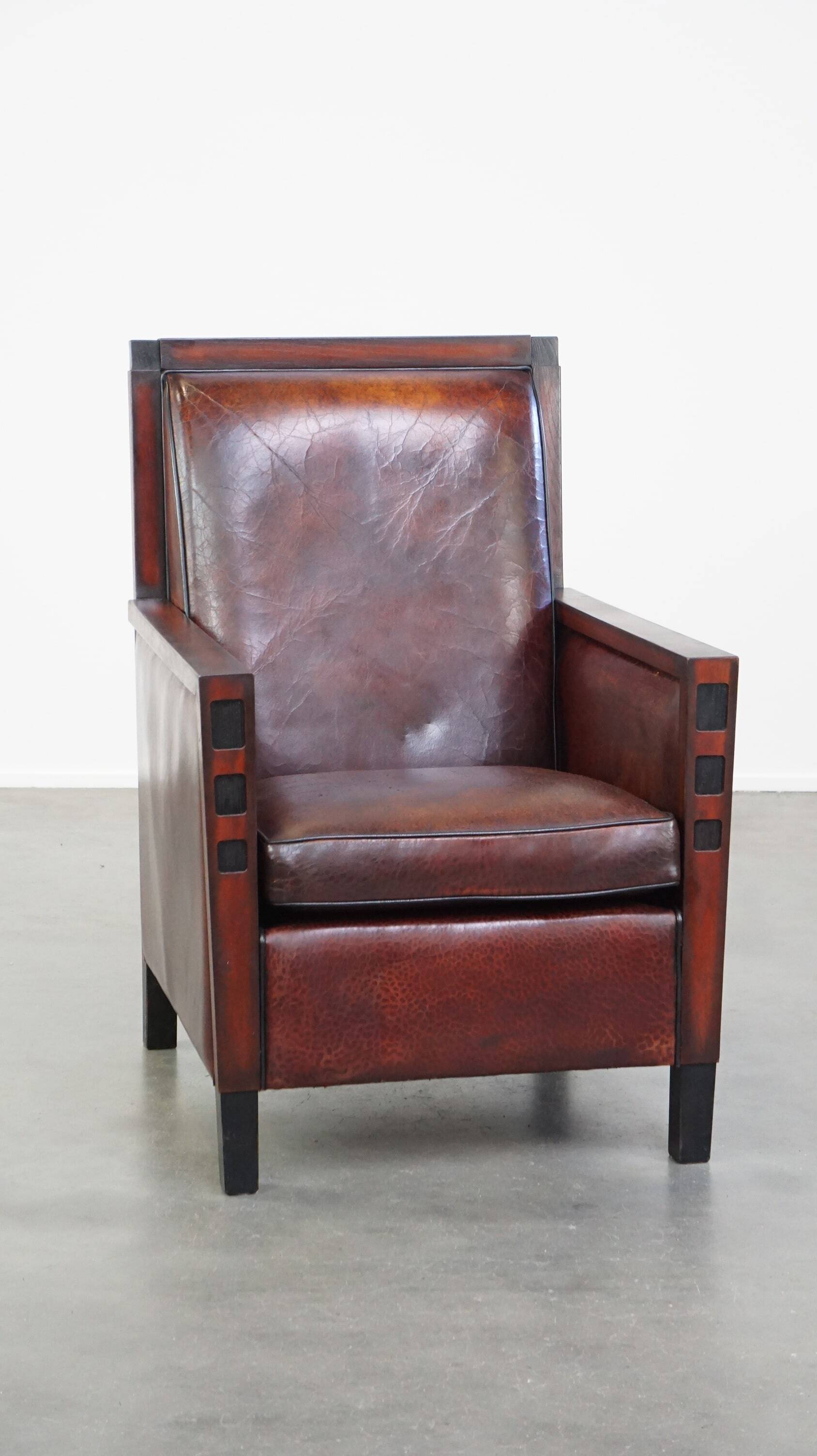 Sheepskin Art Deco design armchair combined with wood