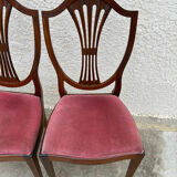 Set of 6 wooden chairs sitting red