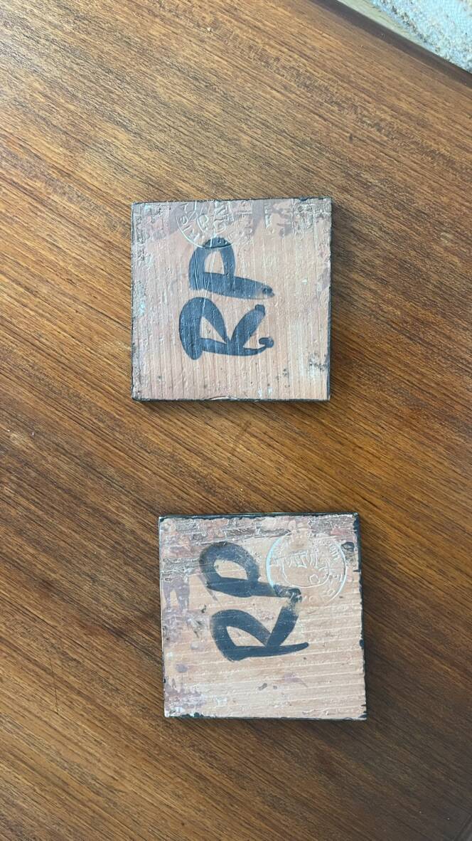 Pair of Robert Picault ceramic trivets with geometric patterns