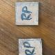 Pair of Robert Picault ceramic trivets with geometric patterns