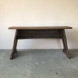 Art and Crafts style organ bench in solid oak.