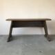Art and Crafts style organ bench in solid oak.