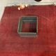 Designer coffee table in metal and glass top (120x120cm)