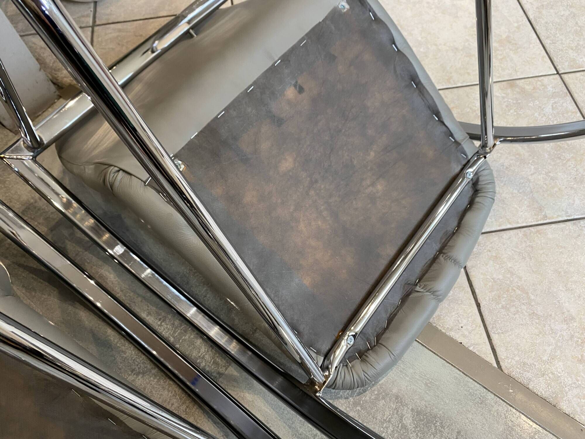 Pair of Souvignet armchairs, grey leather, chrome, 1980.