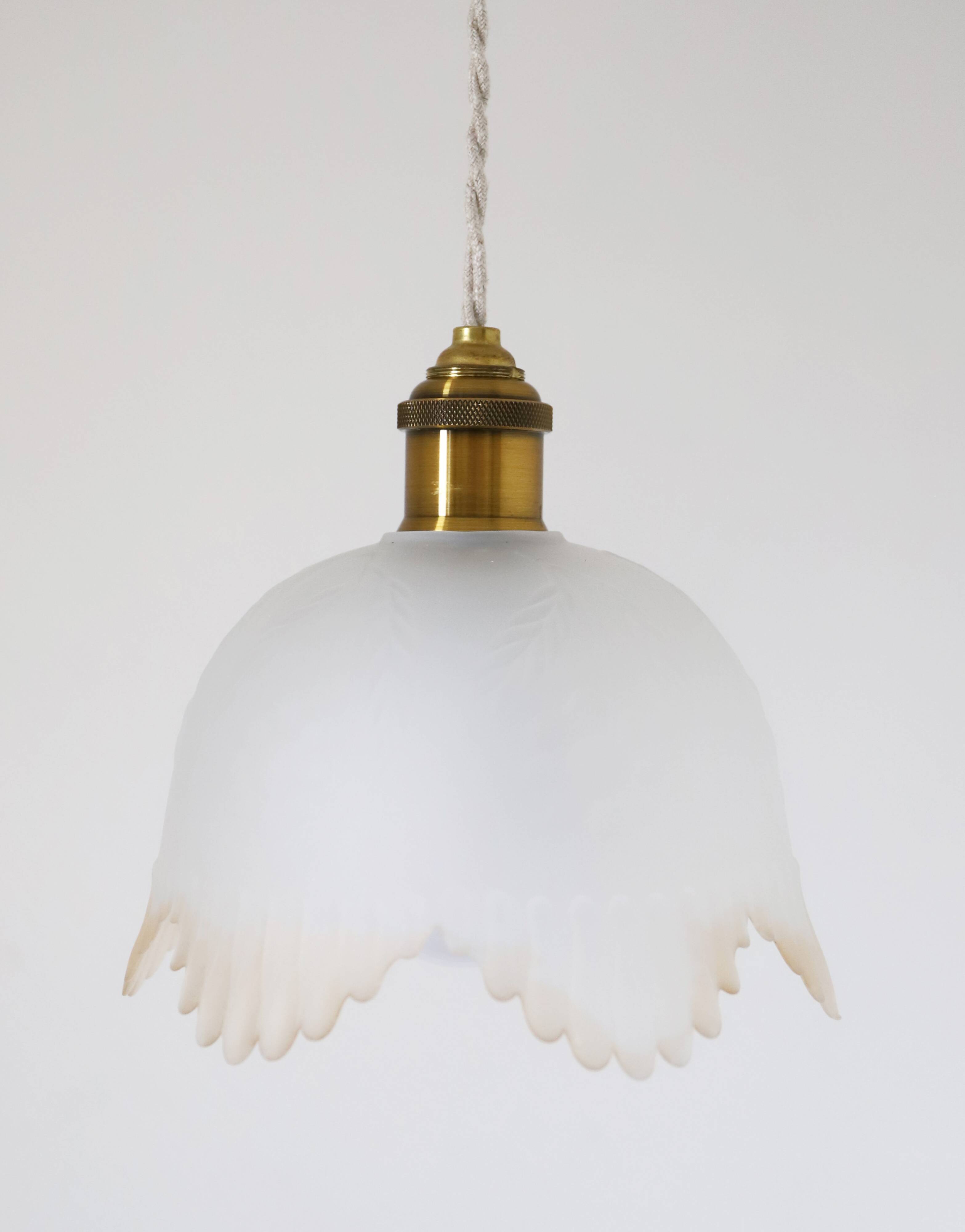 Frosted glass pendant light with floral pattern and wavy edge