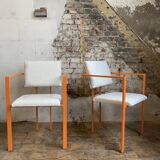 Pair of postmodern orange armchairs and bouclé wool fabric