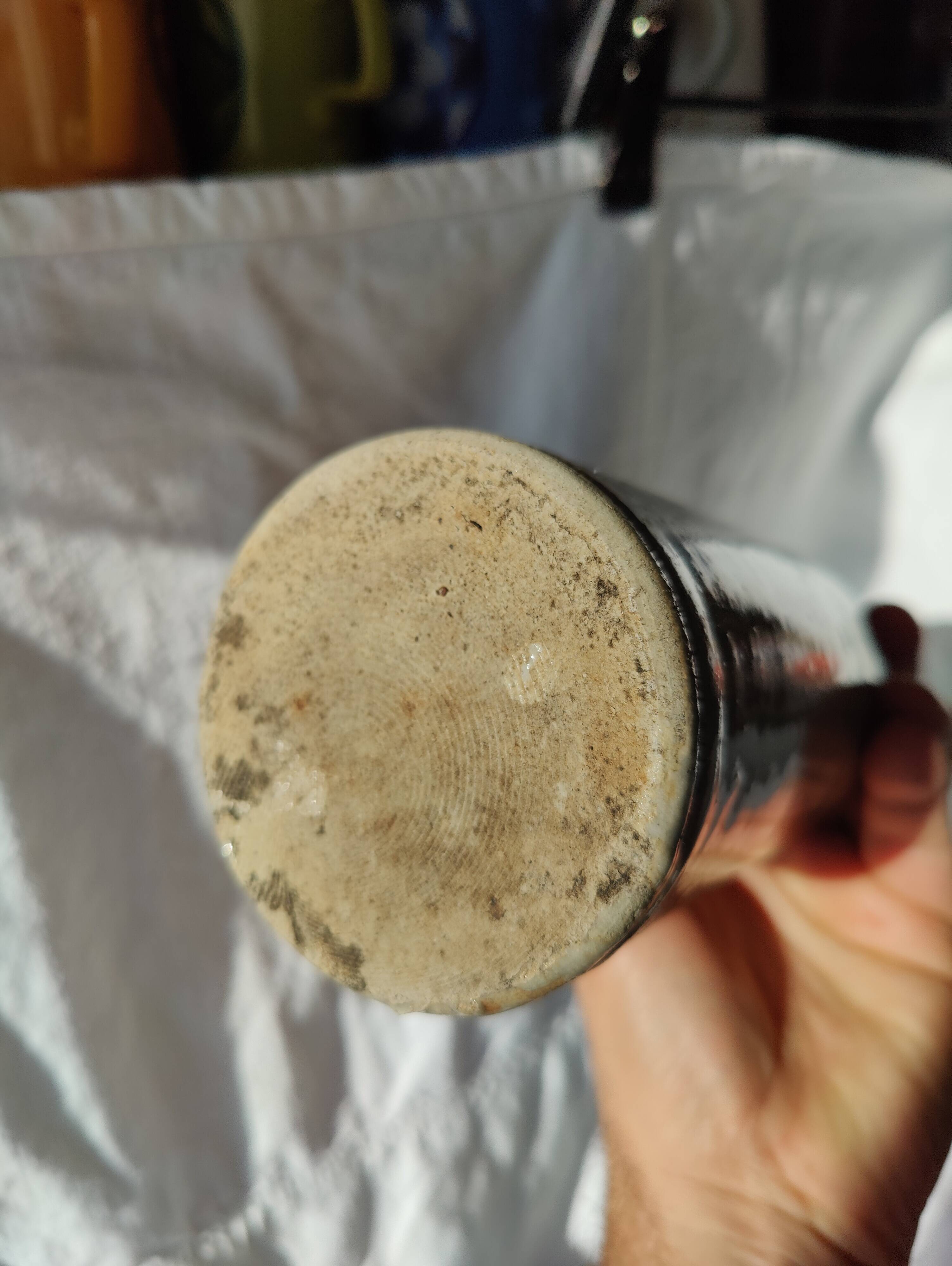 Vintage enamelled stoneware bottle