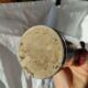 Vintage enamelled stoneware bottle