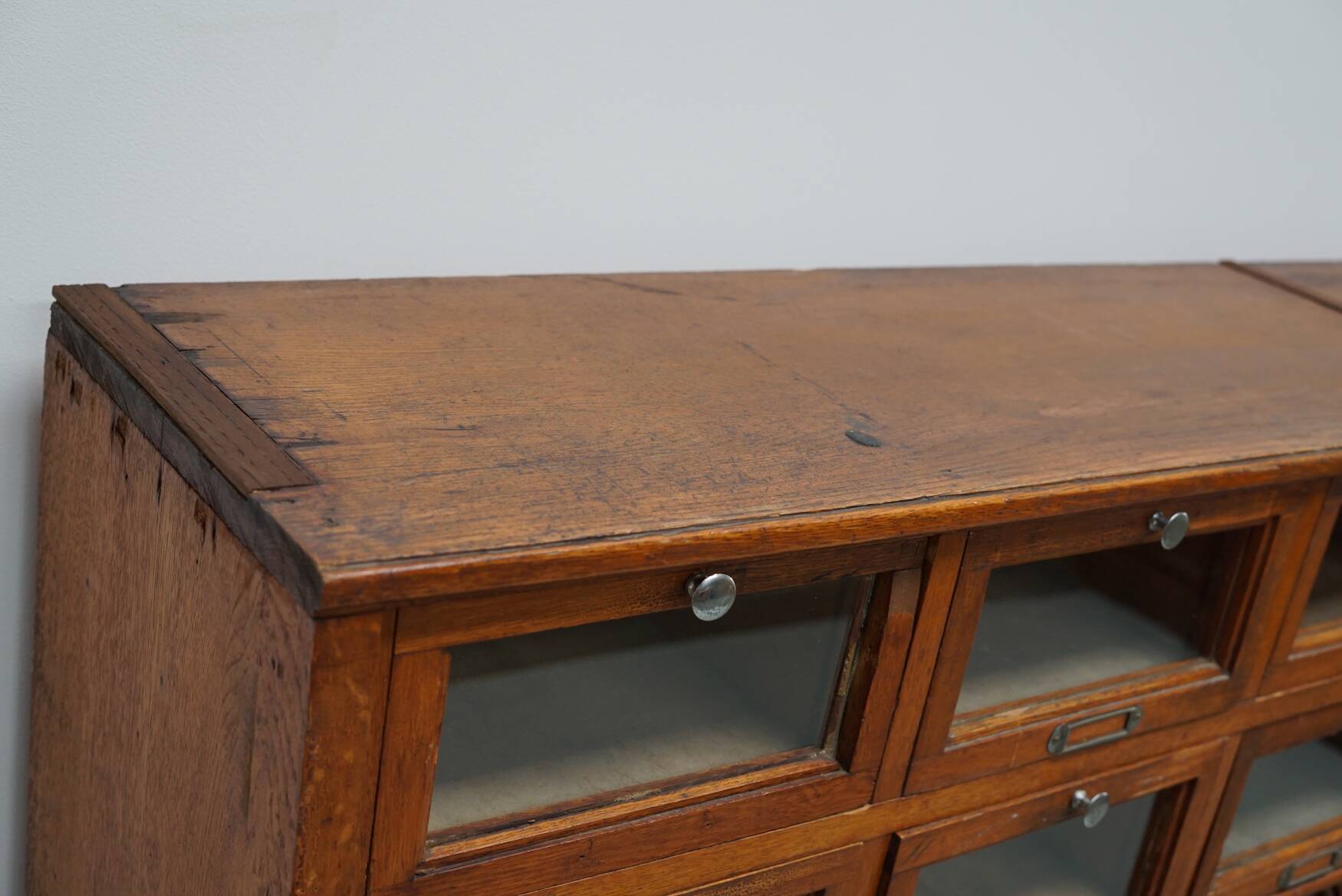 Very large Dutch oak showcase for grocery or haberdashery, 1920s-1930s